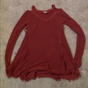 a long sleeve maroon color sweater